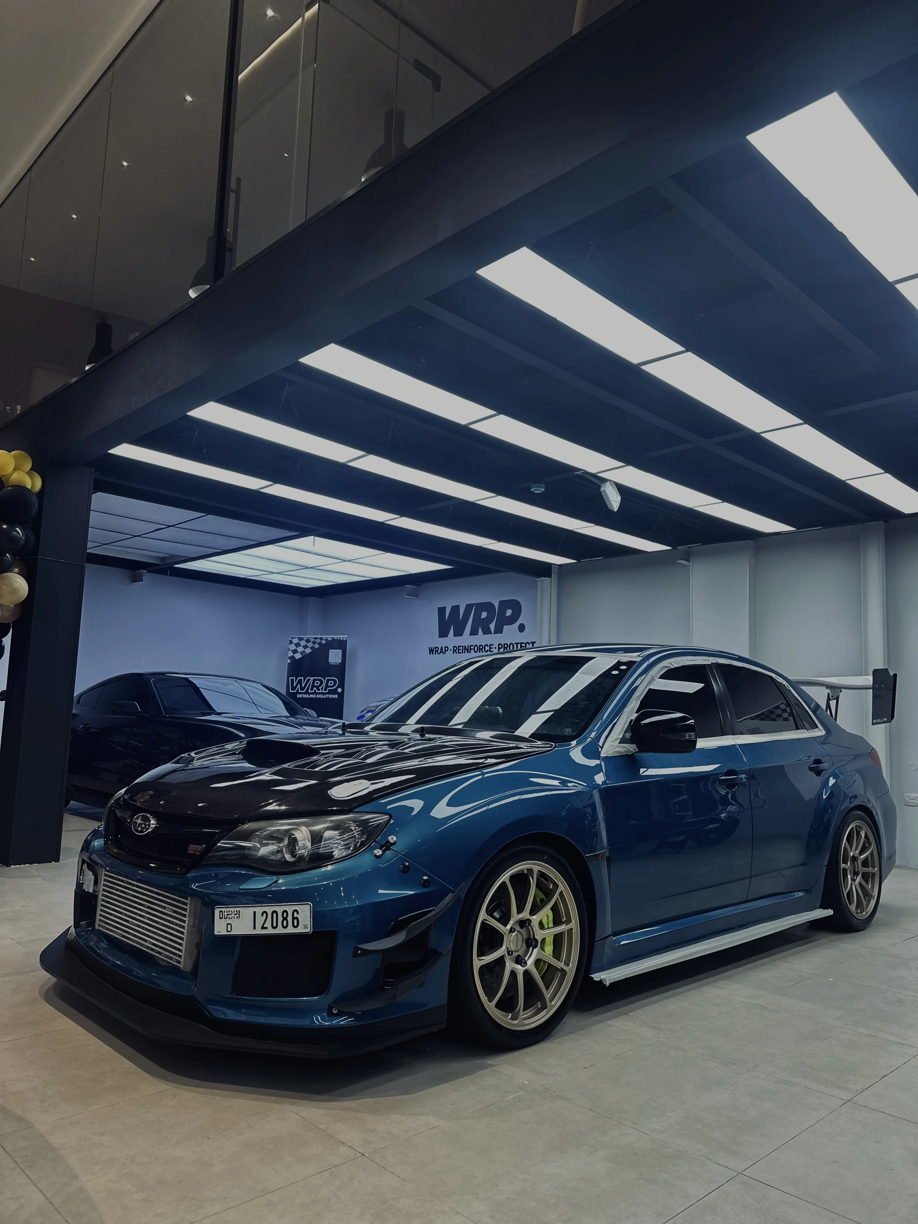 Subaru WRX STI Premium Wash & Paint Protection - Professional car detailing work completed at WRP Dubai luxury automotive studio