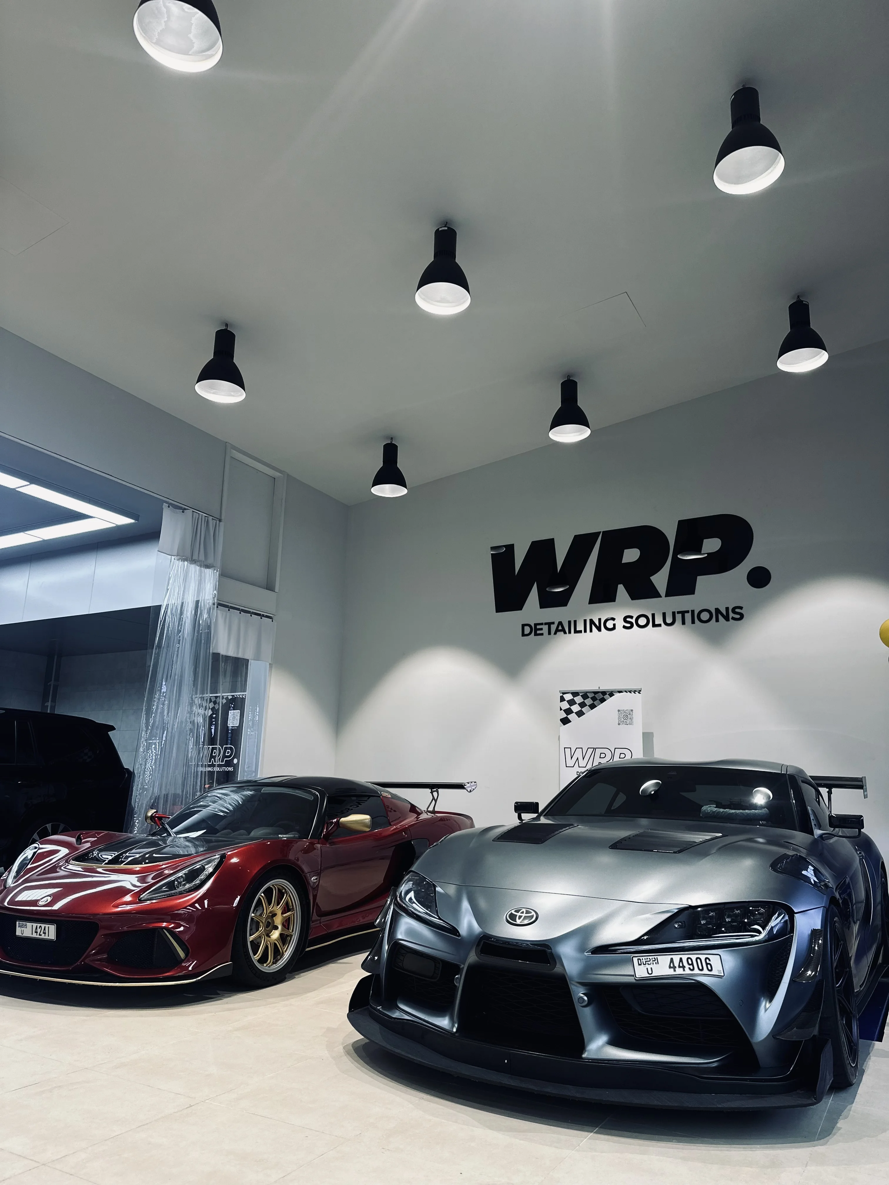 Toyota Supra & Lotus Showroom Detailing - Professional car detailing work completed at WRP Dubai luxury automotive studio