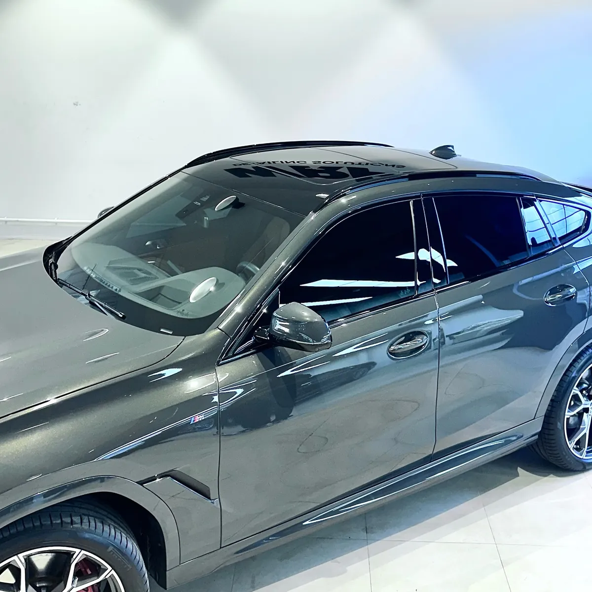 Grey BMW X6 with paint protection film at WRP Detailing Studio in Dubai
