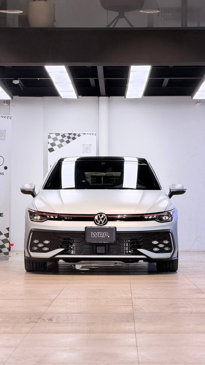 Silver Volkswagen Golf GTI with full paint protection film, front view at WRP Detailing Studio in Dubai