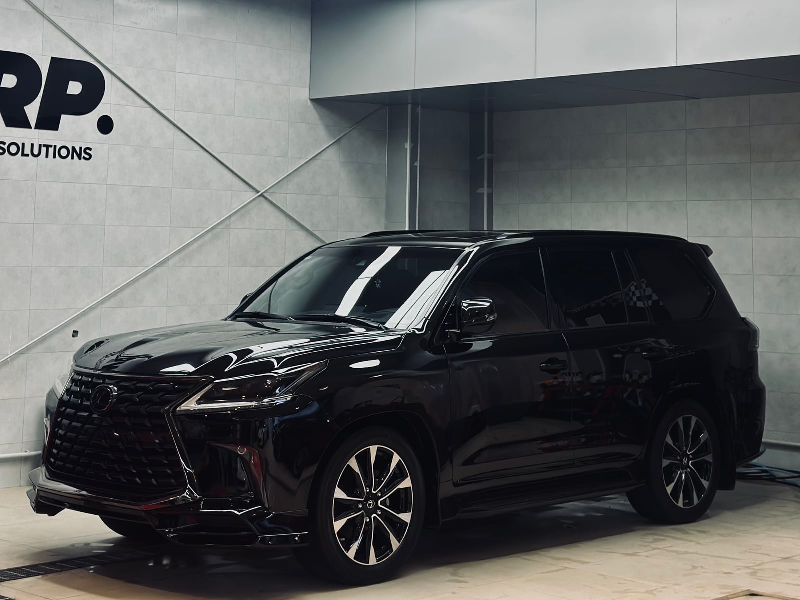 A black Lexus LX after a Level 3 wash at WRP Detailing Studio in Dubai